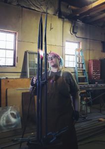 ABANA member, Chelsea Brimer, working on the BlackJack Battlefield Gate during a group work session.